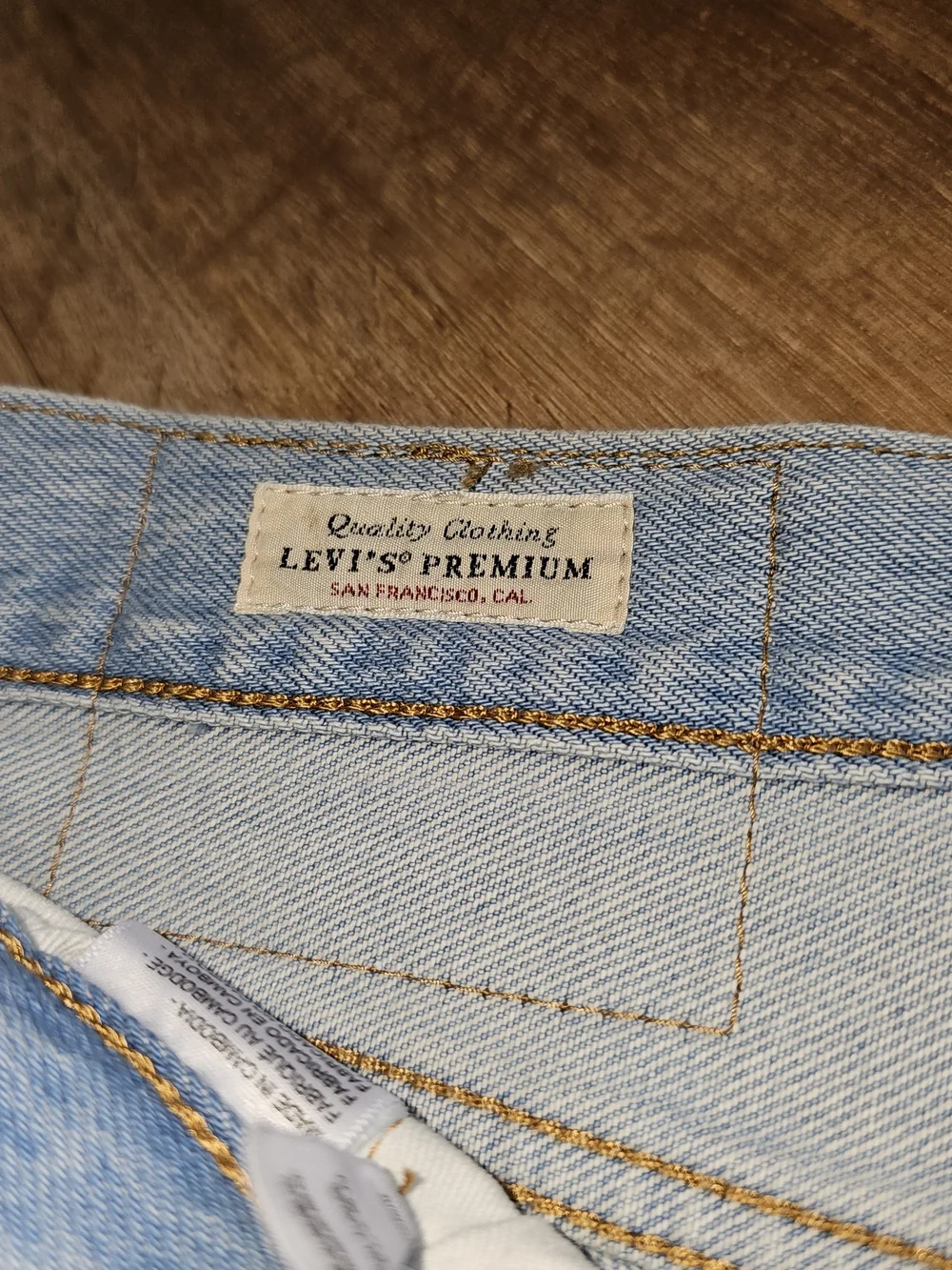 Levi's Light Blue Straight Men's Jeans with Knee Rips